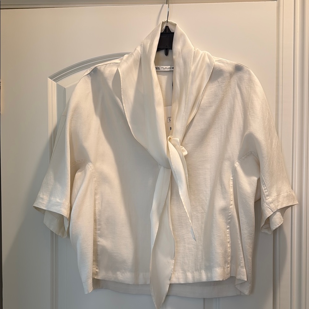 Elegant Cream Blouse with Tie Neck